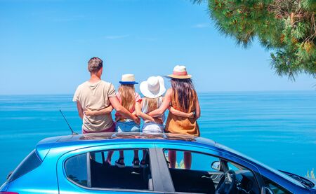Summer car trip and young family on vacationの写真素材