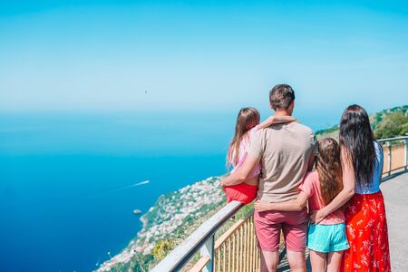 Family on summer vacation on the background of Amalfi Coast, Italyの写真素材