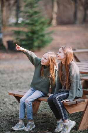 Little girls in outdoor park on her weekendの写真素材