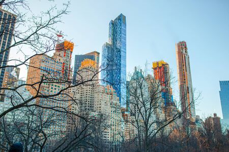 Ice skaters having fun in New York Central Park in winterの写真素材