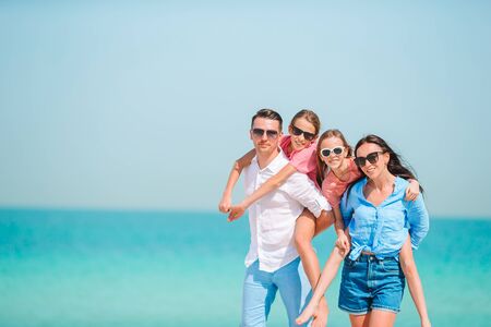 Young family on vacation have a lot of funの写真素材