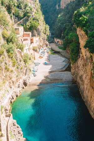 Famous fiordo di furore beach seen from bridge. View of Furore creek, near Sorrento, Amalfi coast, southern Italyの写真素材