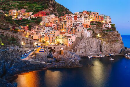 View on architecture of Manarola town in sunset light. Manarola is one of the most popular town in Cinque Terre National park, Italyの写真素材