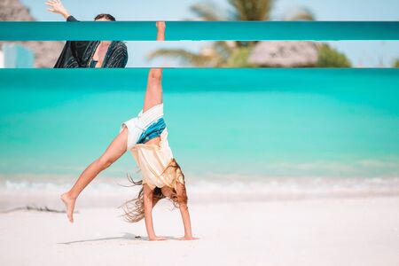 Happy kid enjoy beach tropical vacationの写真素材