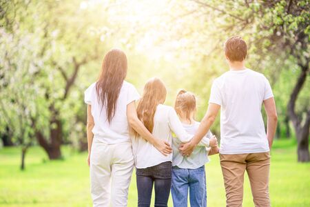 Family of four in the park outdoorsの写真素材