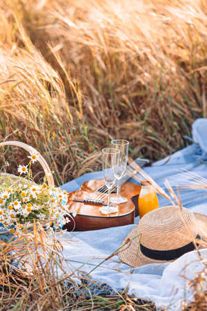 Closeup of picnic on nature in wheat field.の写真素材