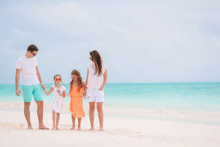 Young family on vacation have a lot of funの写真素材
