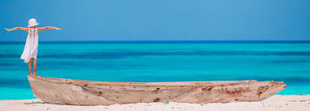 Cute little girl at beach during summer vacationの写真素材