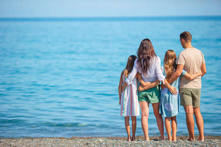 Young family on vacation have a lot of funの写真素材