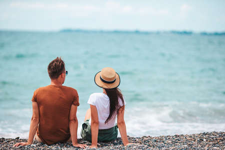 Young couple on white beach during summer vacation.の写真素材
