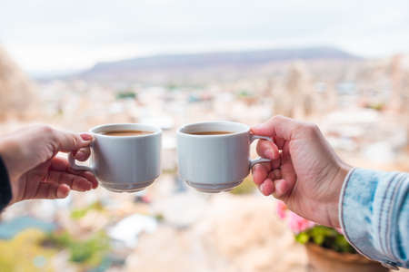 Cup with traditional Turkish coffee on a background of a valley in Cappadocia, Turkey.の写真素材