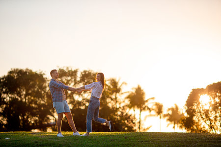 Family of two in the park on summer day outdoorsの写真素材