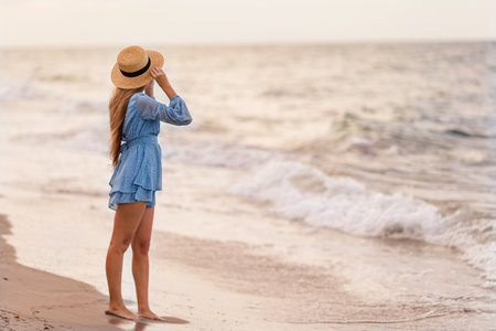 Happy girl enjoy summer vacation on the beachの写真素材