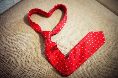 Red necktie shape of heartの写真素材