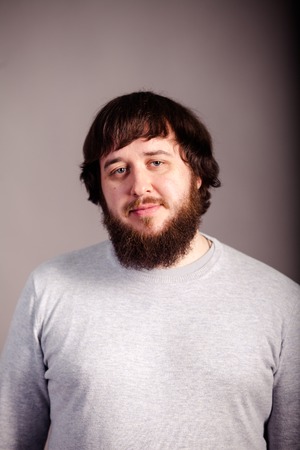 Portrait of tattooed bearded man. Brutal manの写真素材