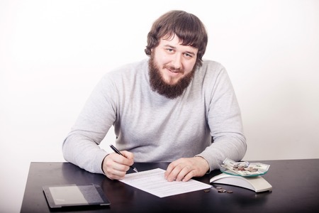 Business agreement signing, businesswoman handwriting signature on contract document at office desk