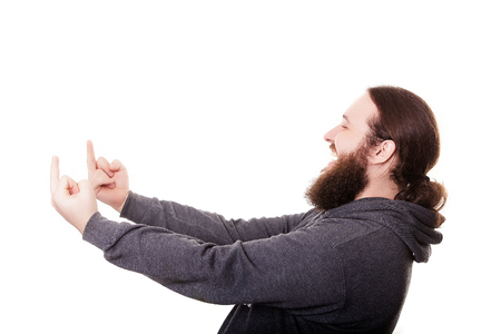 Portrait of a young man showing middle finger gesturing fuck isolated on white backgroundの写真素材