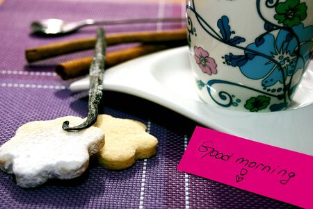 Delicious homemade cookies,coffee and a noteの写真素材