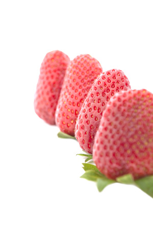 Fresh strawberries isolated on white backgroundの写真素材
