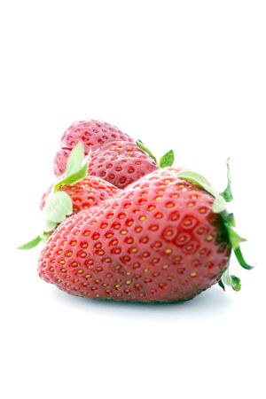 Fresh strawberries isolated on white backgroundの写真素材