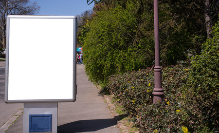 Vertical blank billboard on a city streetの写真素材