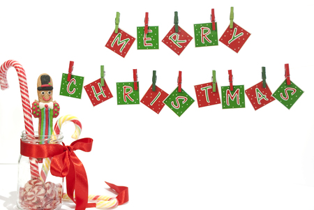 Decoration for Christmas with hanging letters and some candiesの写真素材