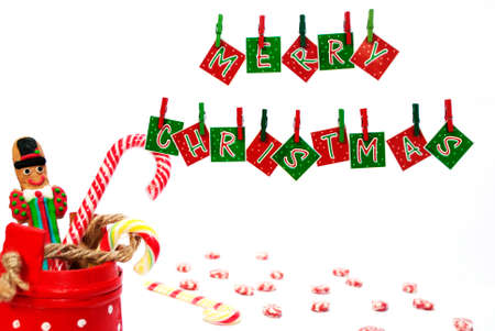 Decoration for Christmas with hanging letters and some candiesの写真素材