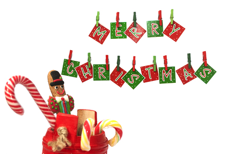 Decoration for Christmas with hanging letters and some candiesの写真素材