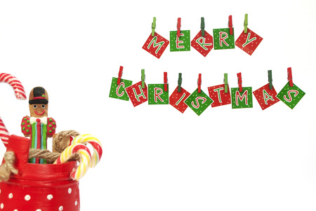 Decoration for Christmas with hanging letters and some candiesの写真素材