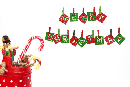 Decoration for Christmas with hanging letters and some candiesの写真素材