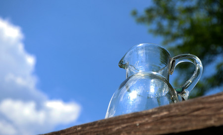 Empty jug facing the skyの写真素材