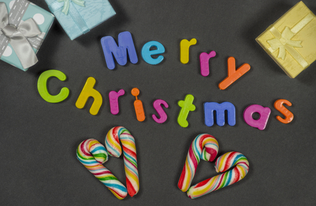 Colorful christmas letters on black backgroundの写真素材