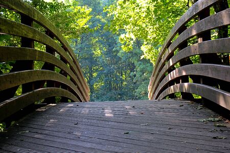 Close up front view of a wooden Bridge with focus on foregroundの写真素材