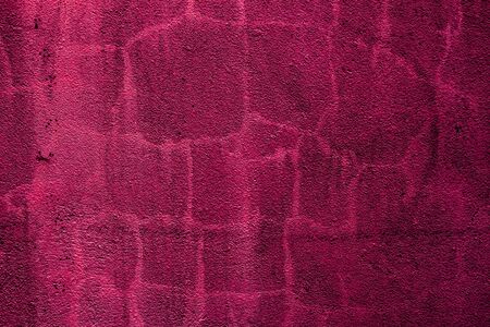 Crimson colored background with textures of different shades of crimsonの写真素材