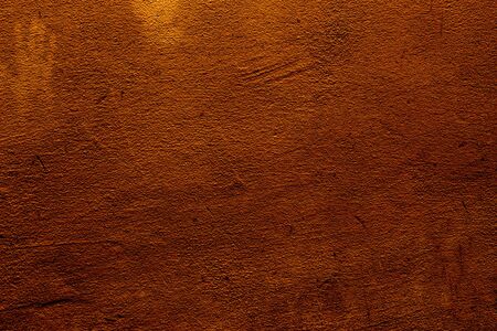 Copper colored background with textures of different shades of copper
