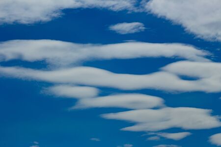 Fluffy clouds and blue sky