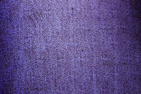 Purple colored abstract wall background with textures of different shades of purpleの写真素材