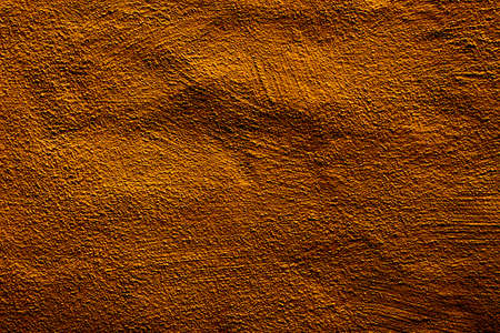 Copper colored wall texture background with textures of different shades of copper or bronzeの写真素材