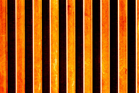 Orange or copper colored vertical lines texture for background