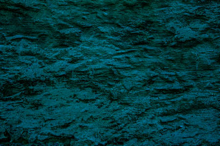 Petrol colored abstract texture background with textures of different shades of petrol also called...