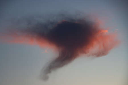 Red cirrus clouds during sunset