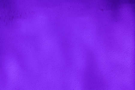 Purple colored wall background with textures of different shades of violet or purple