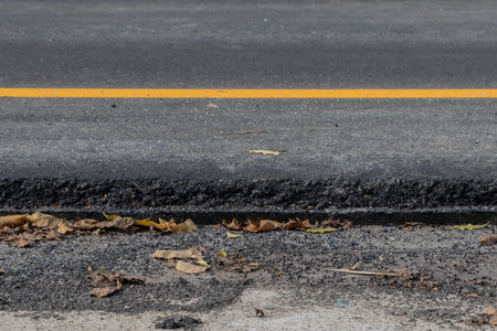 Side view of new layer of pavement