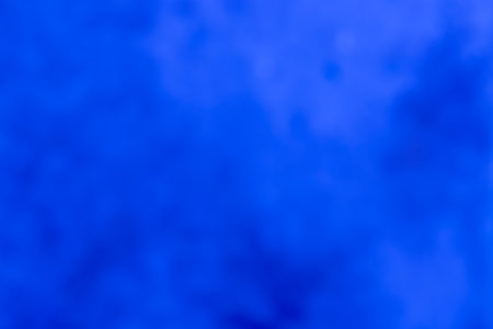 Blue defocused abstract smooth asymmetric gradient backgroundの写真素材