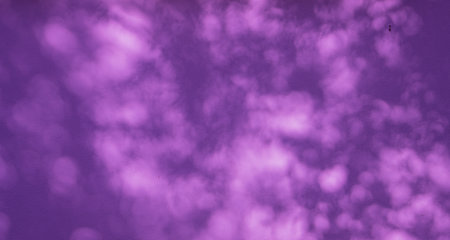 Purple colored abstract wall background with textures of different shades of purpleの写真素材