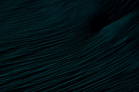 Teal abstract plastic foil background with 3d effect and bubblesの写真素材