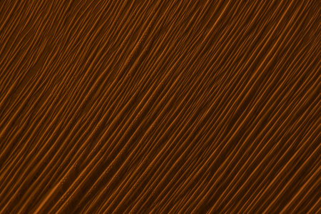 Copper abstract plastic foil background with 3d effect and bubblesの写真素材
