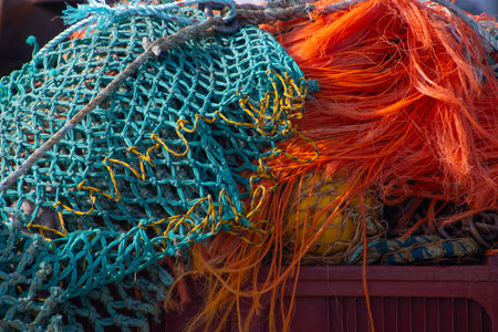 Close up of empty colorful fishing netsの写真素材