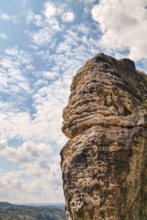 A typical rock formation in Saxon Switzerland made of sandstone in the hiking and climbing area of the German Elbe Sandstone Mountainsの写真素材