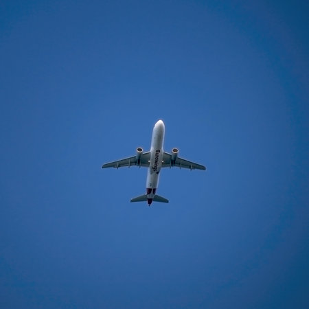Eurowings Airbus aircraft taking off in the blue sky, seen from below with the lettering claimのeditorial素材